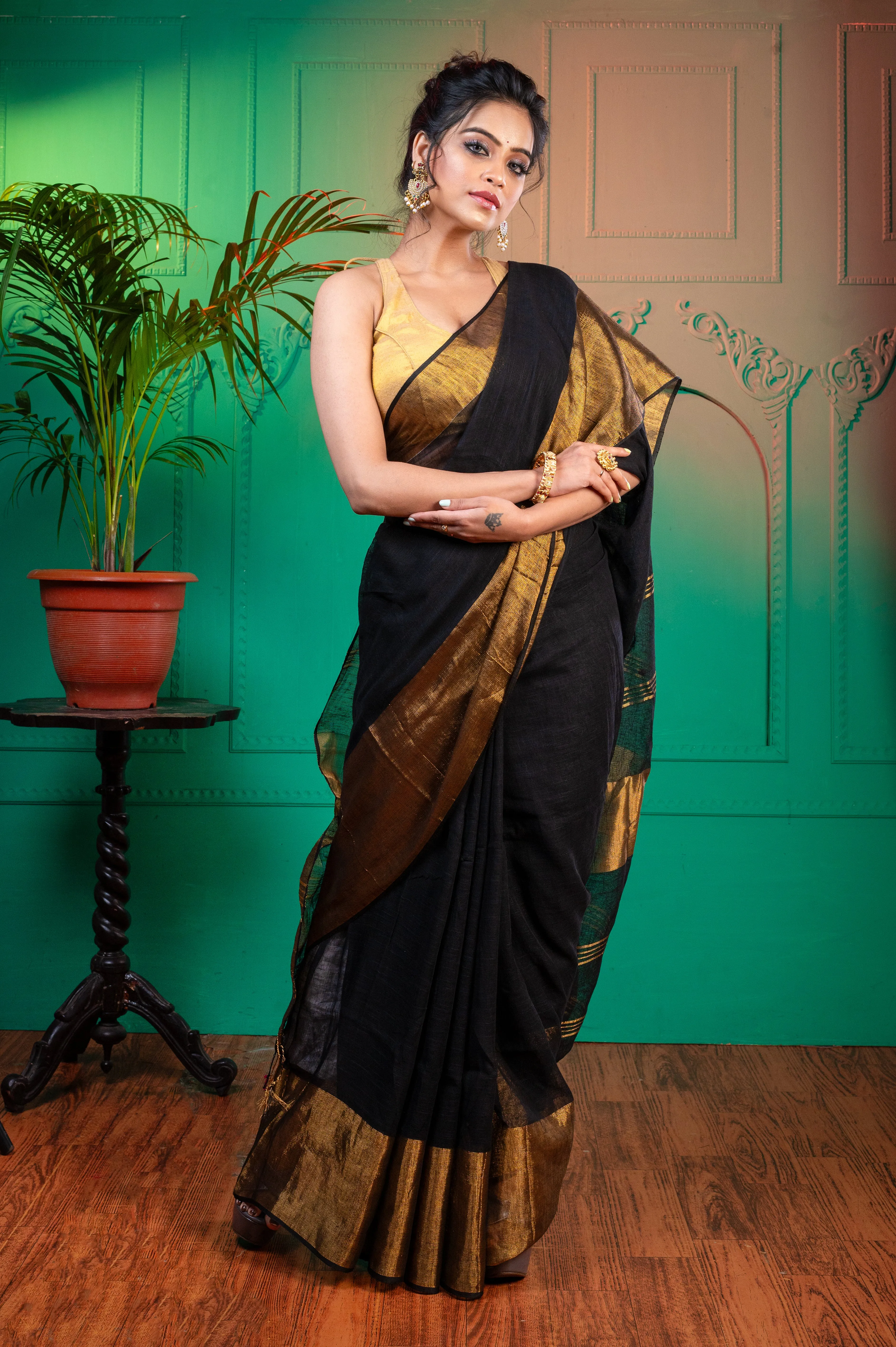 Women Black Pure Handloom Linen Saree With Golden Zari  Border And Pallu